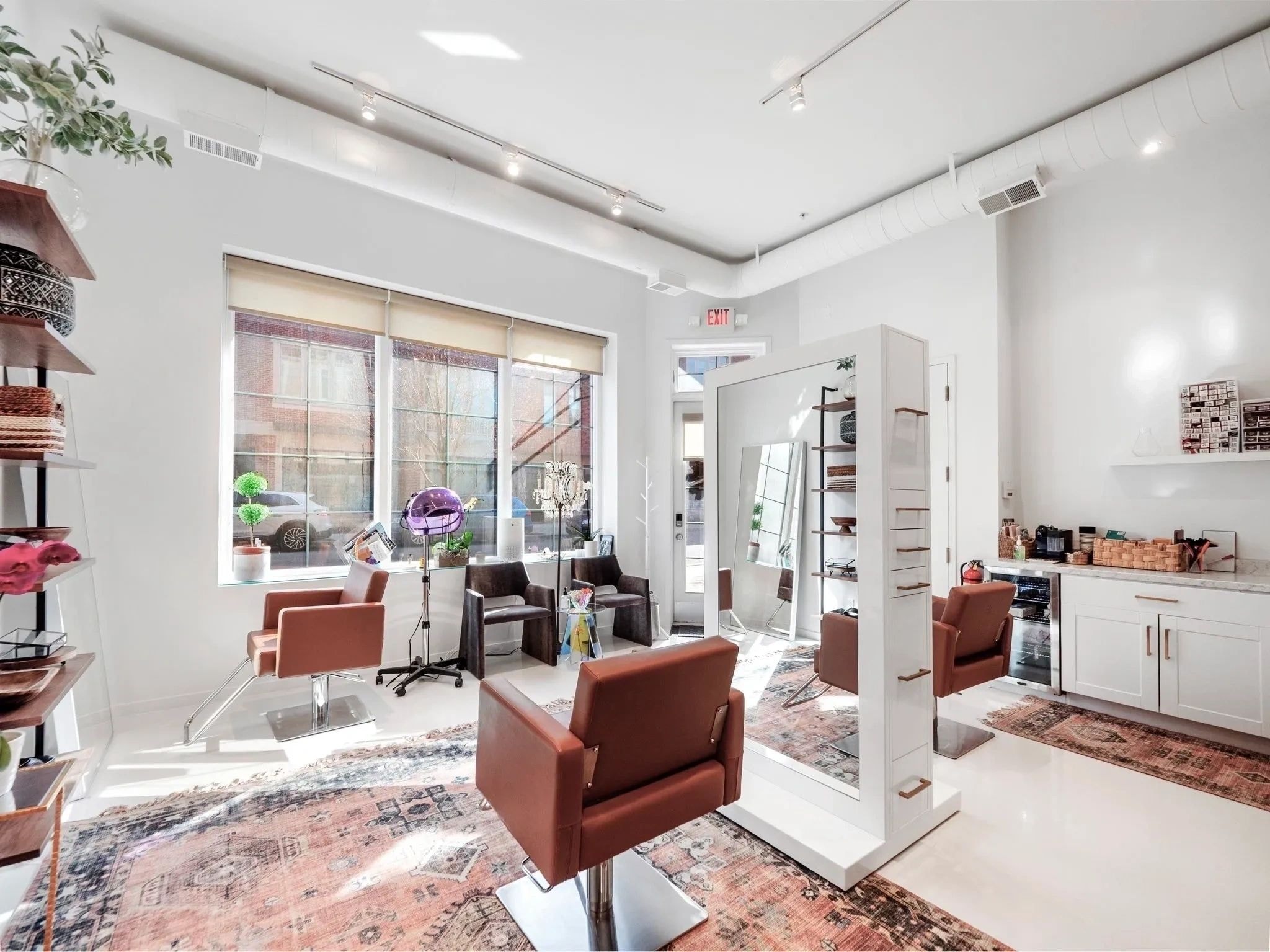 Ornate Space — modern salon interior with styling chairs