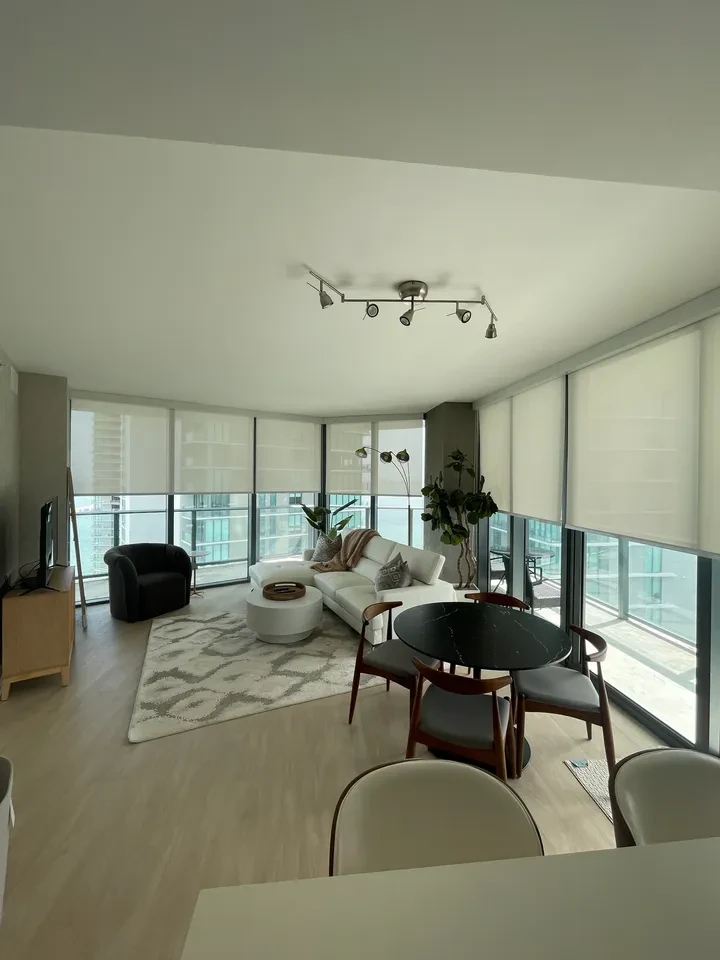 Bay View Project — modern sunroom marble flooring glass doors